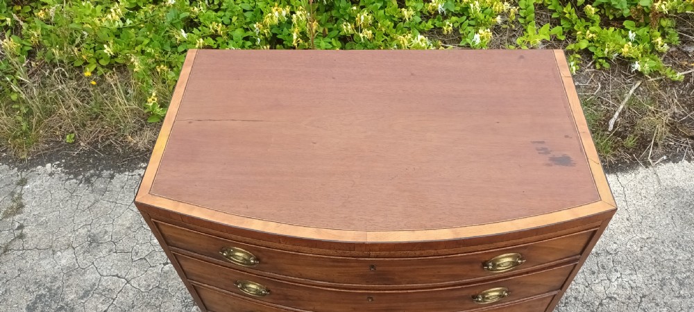 Regency inlaid bow front chest of 4l drawers. View VI