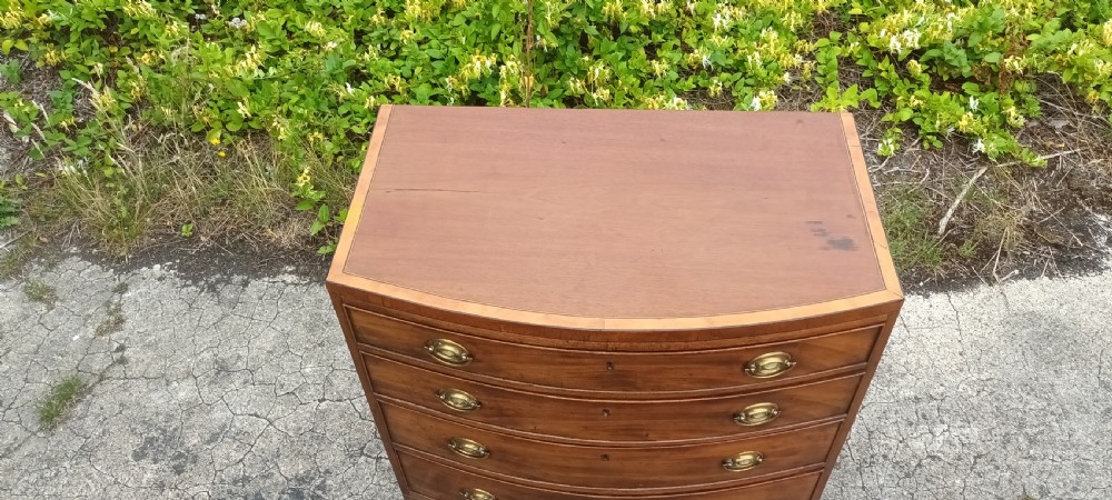 Regency inlaid bow front chest of 4l drawers. View VII