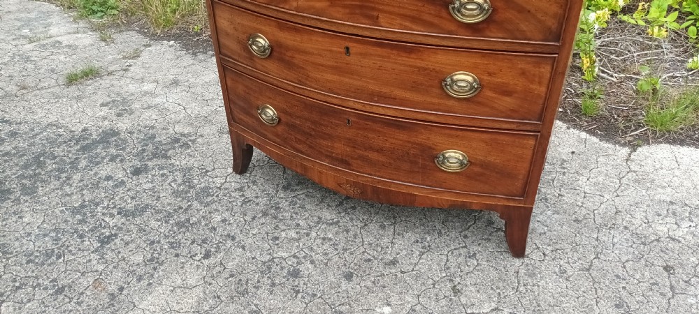 Regency inlaid bow front chest of 4l drawers. View IX