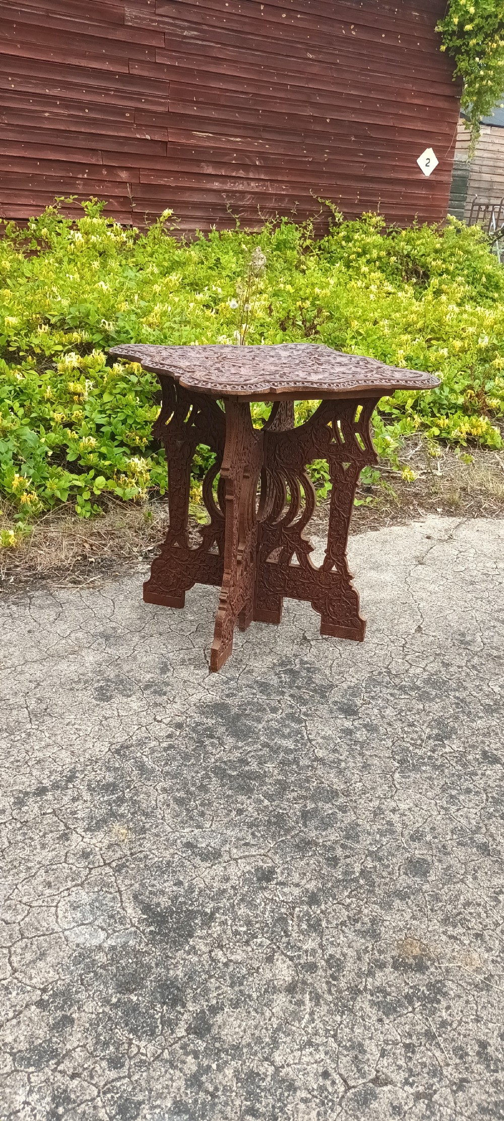 Anglo Indian carved occasional table. View II