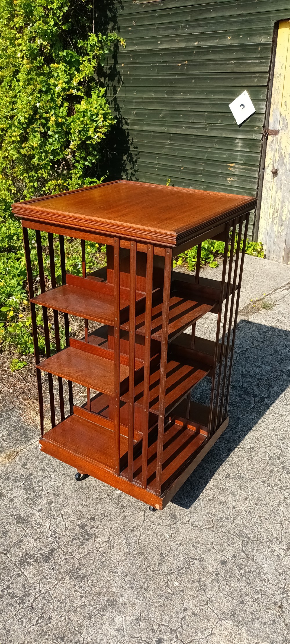 Late Victorian walnut revolving bookcase.