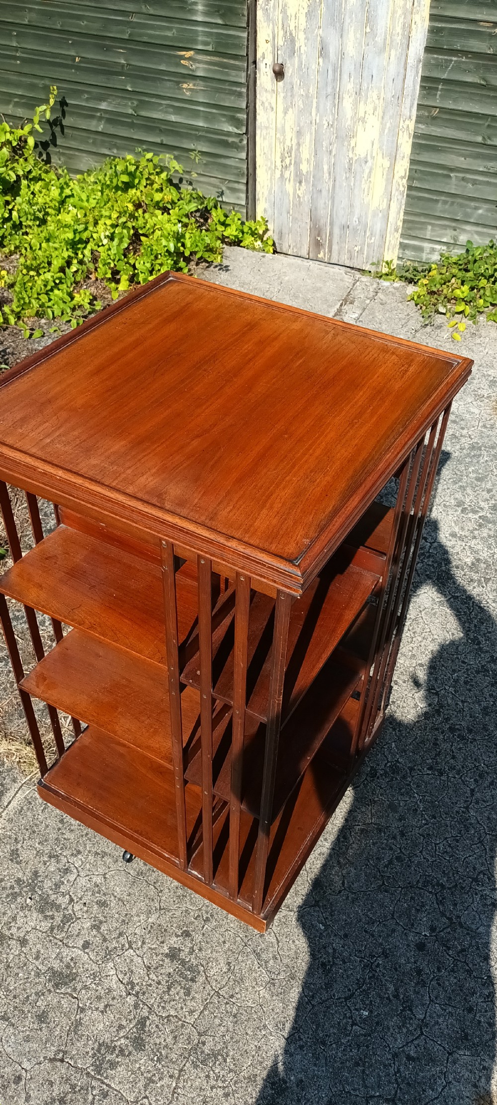 Late Victorian walnut revolving bookcase. View II