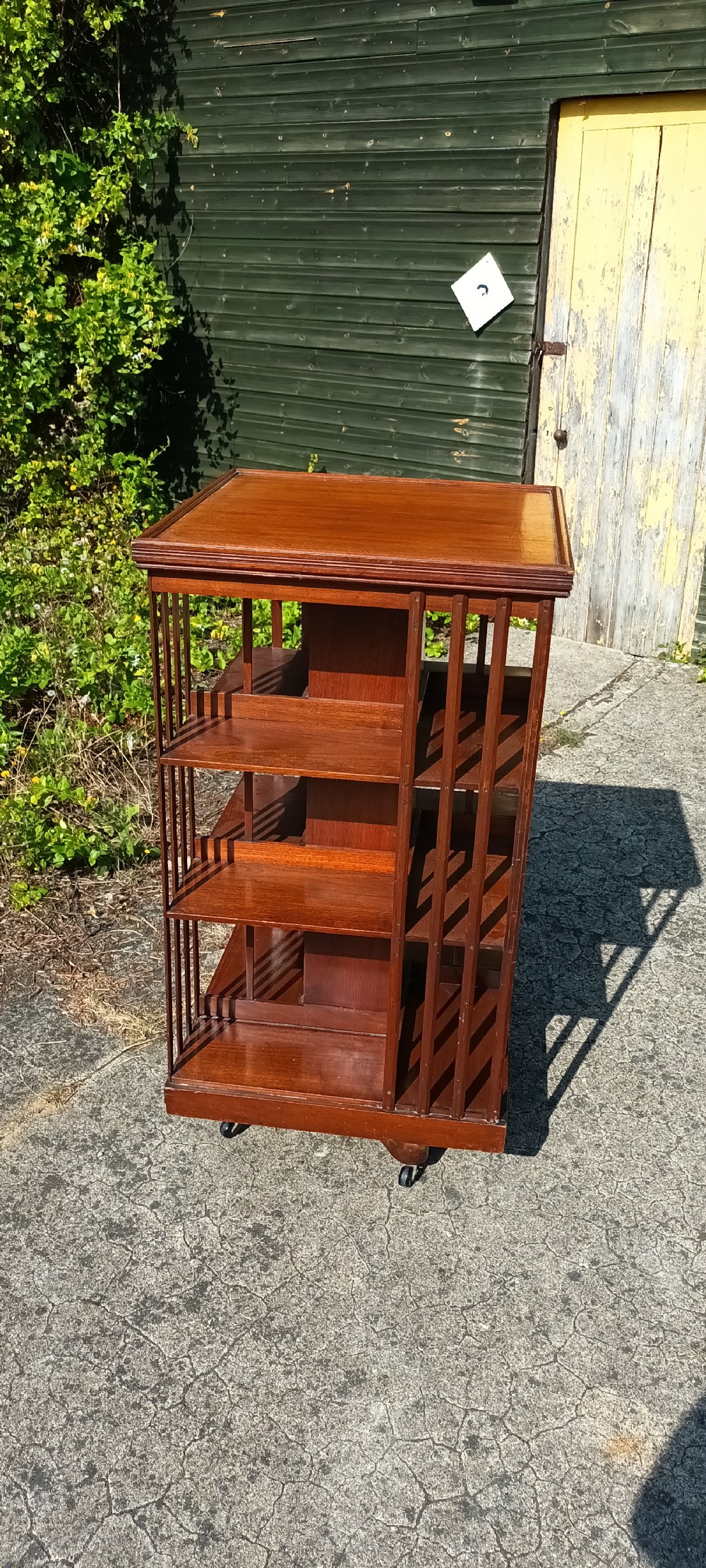 Late Victorian walnut revolving bookcase. View III