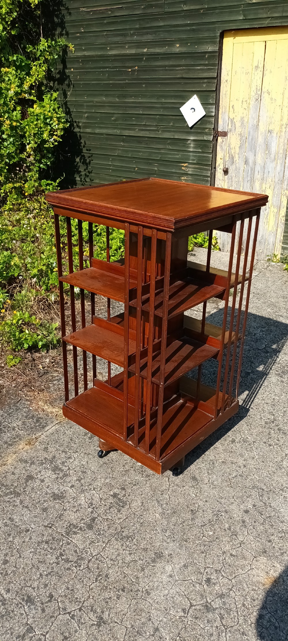 Late Victorian walnut revolving bookcase. View IV