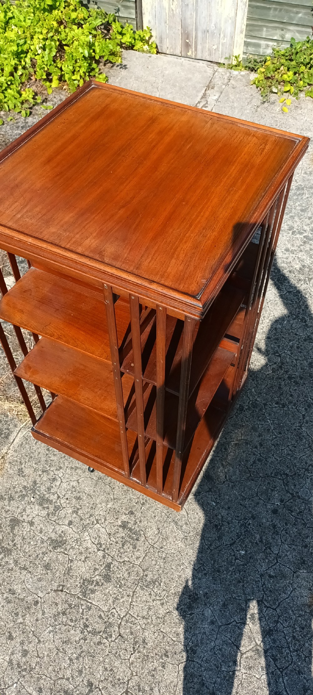 Late Victorian walnut revolving bookcase. View V