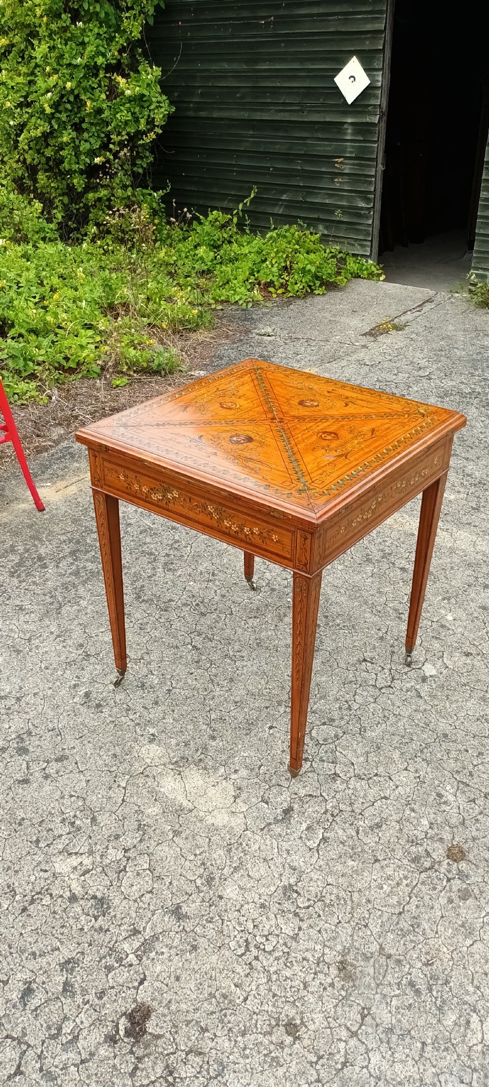 Good quality large decorated satinwood games table. 