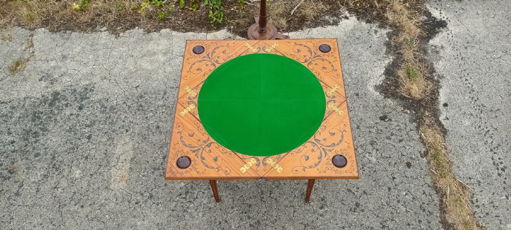 Good quality large decorated satinwood games table.  View II