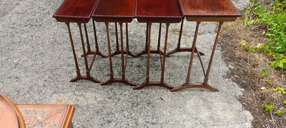 Nest of 4 Edwardian mahogany tables. View III