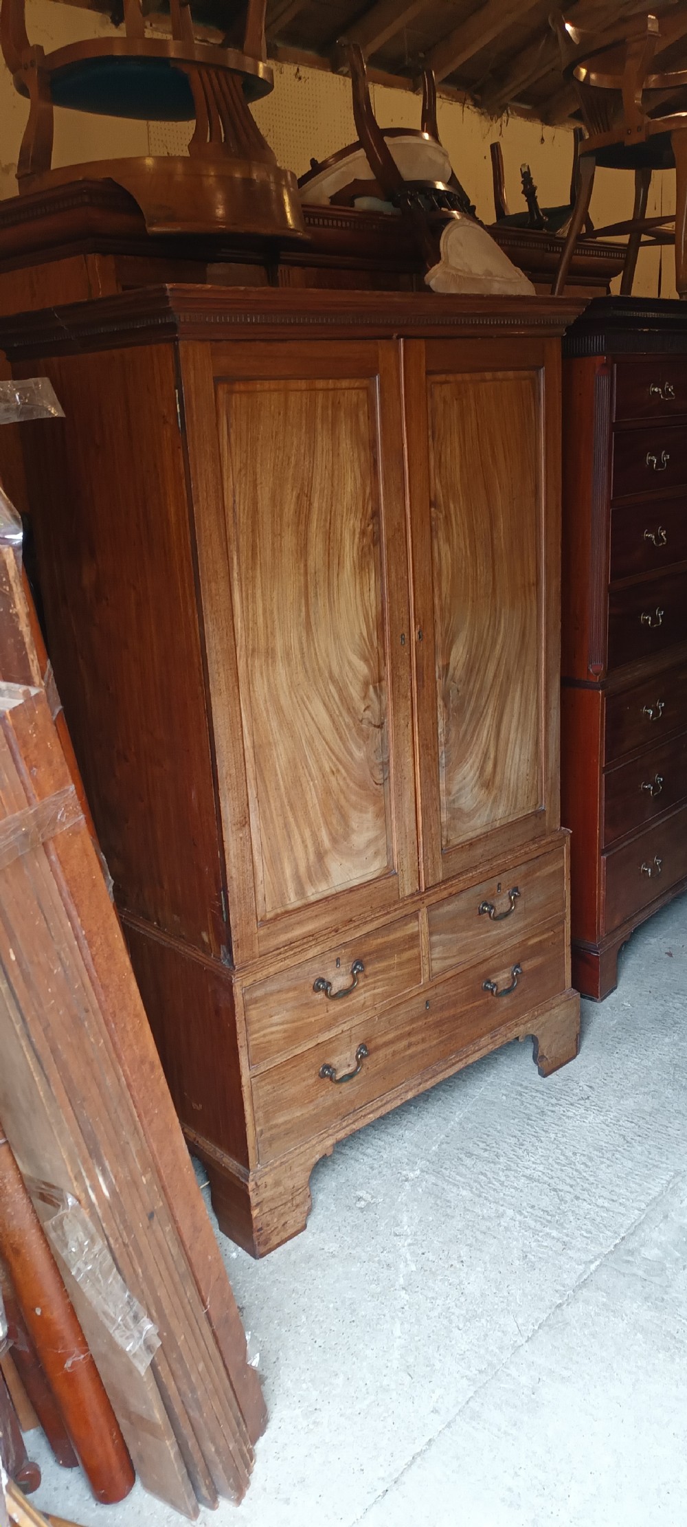Late Georgian mahogany housekeepers linen press cupboard .