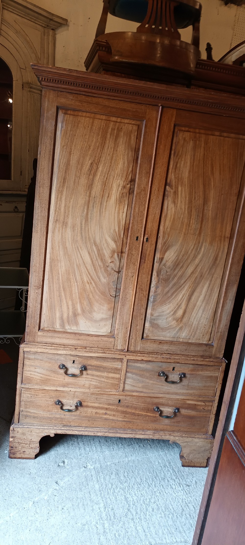 Late Georgian mahogany housekeepers linen press cupboard . View VI