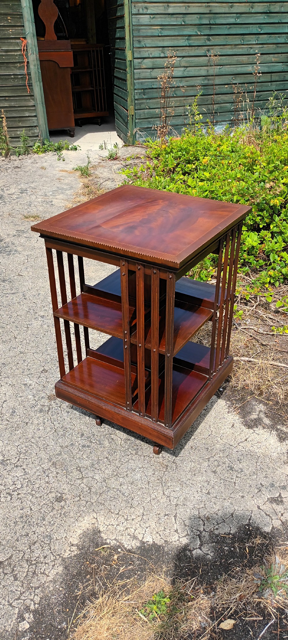 Edwardian inlaid revolving bookcase with metal base . View IV