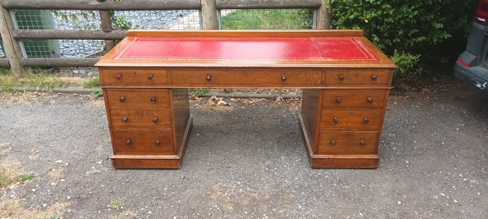 6 foot Victorian oak kneehole pedestal writing desk. View VI