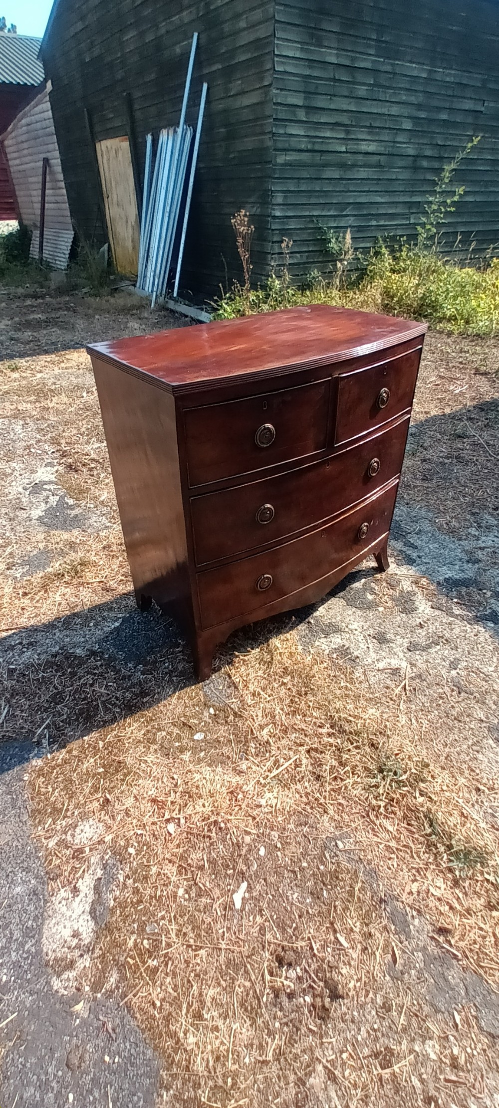 Regency mahogany bow front chest of drawers.  View III