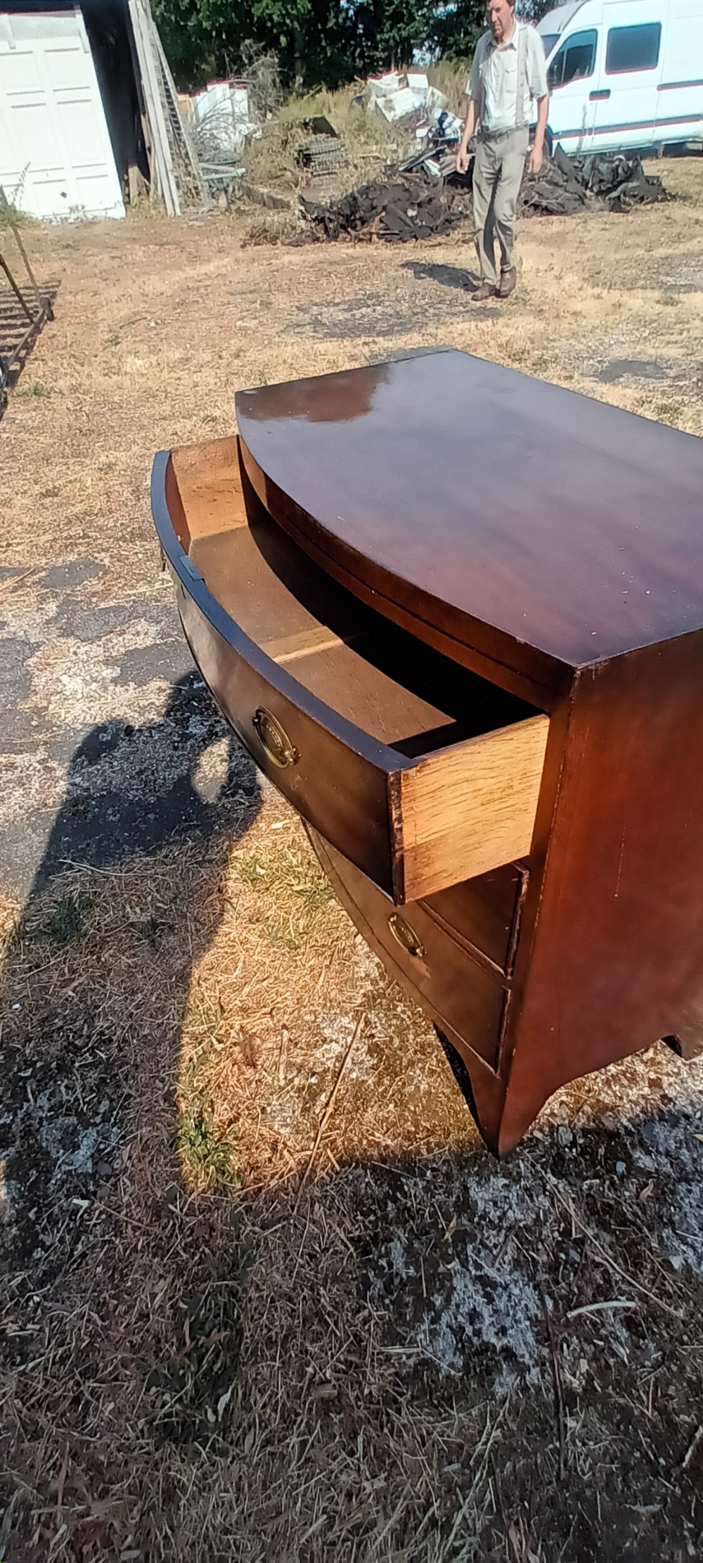 Early Victorian mahogany bow front chest of drawers. View II