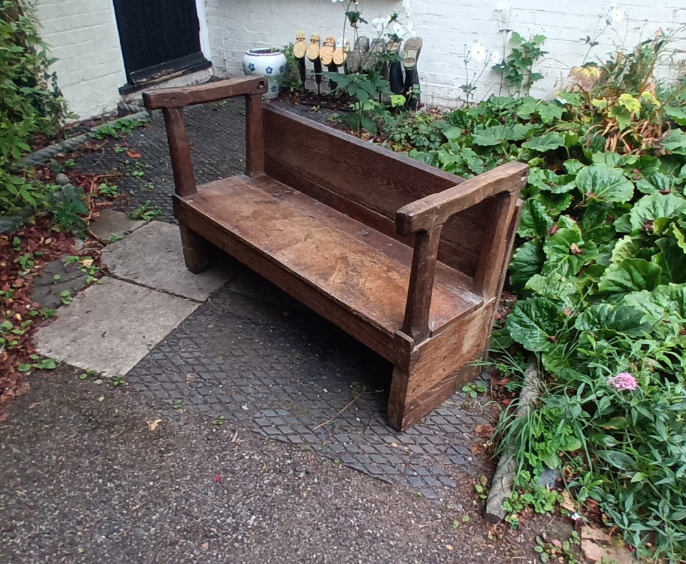 Antique oak hall bench.