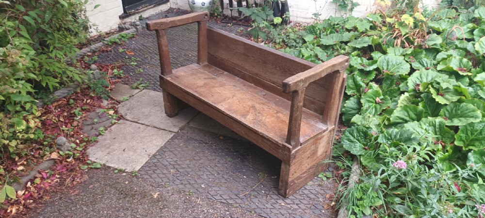 Antique oak hall bench. View II