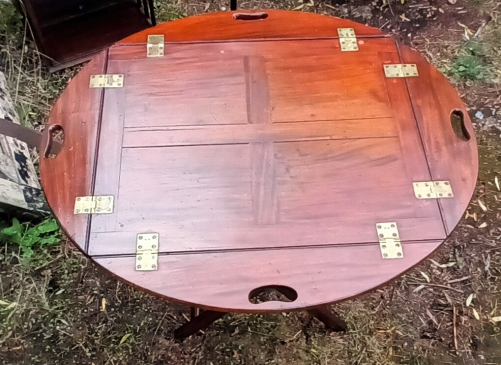 Early 19th century mahogany butlers tray on stand.