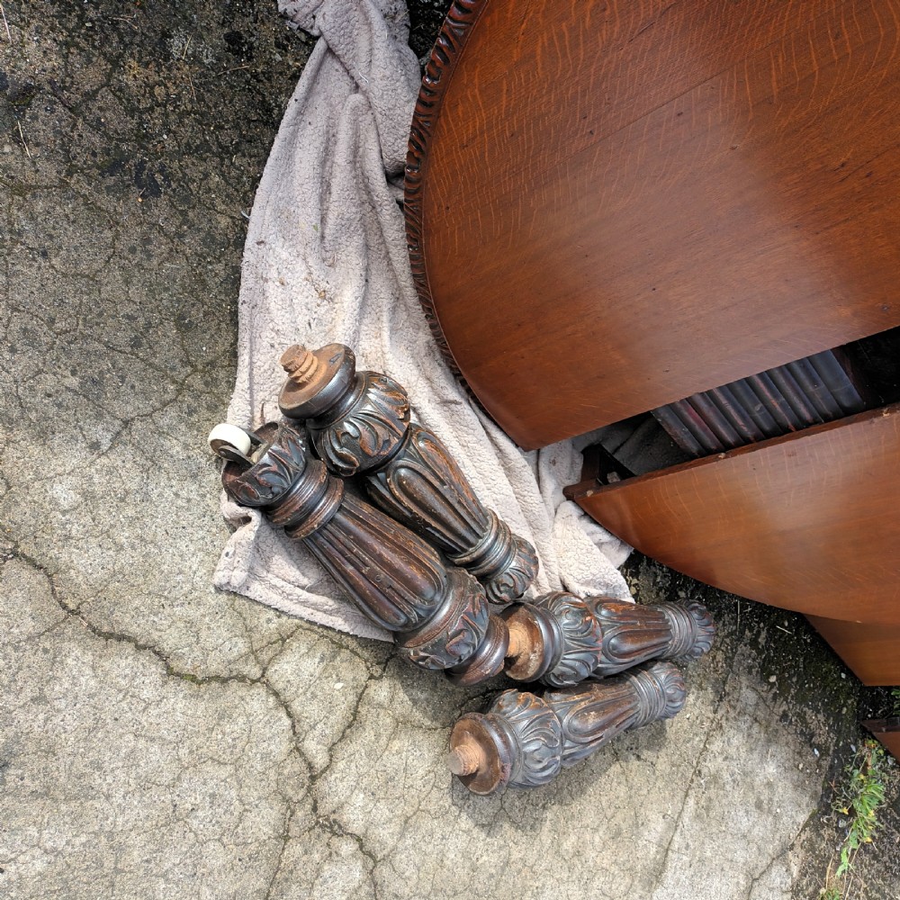 Large Victorian carved oak 2 leaf extending dining table. View V