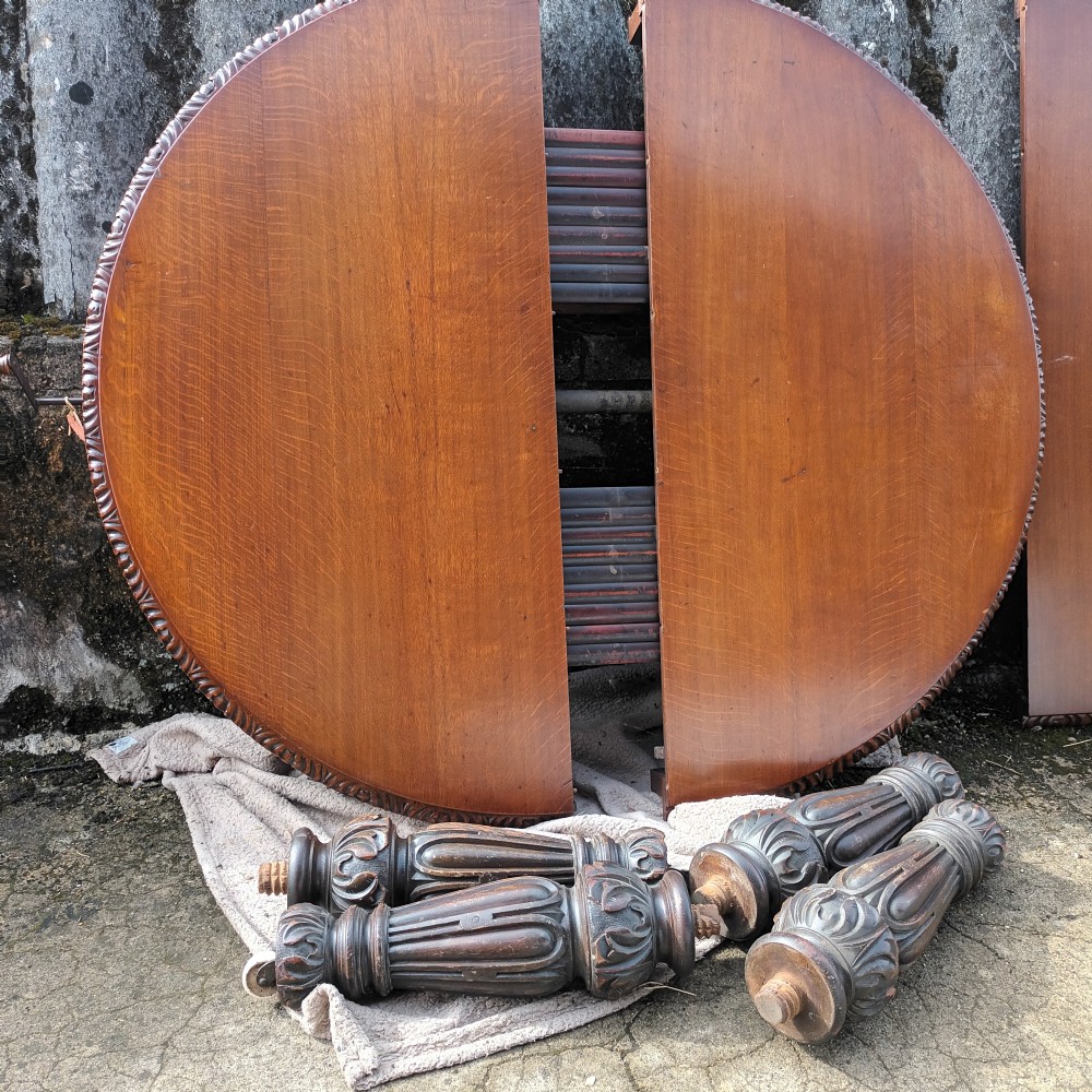Large Victorian carved oak 2 leaf extending dining table. View IX
