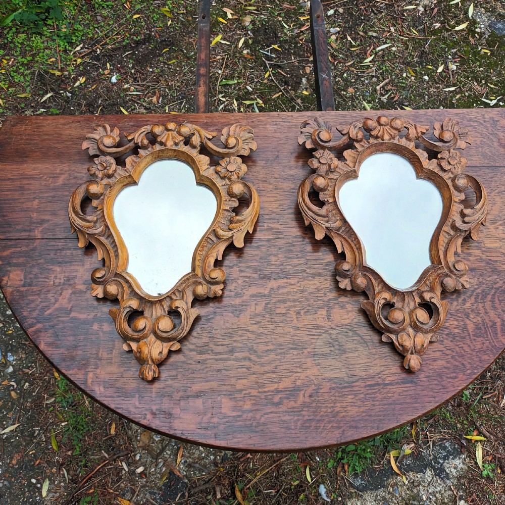 Pair of small carved pine wall mirrors.  View II