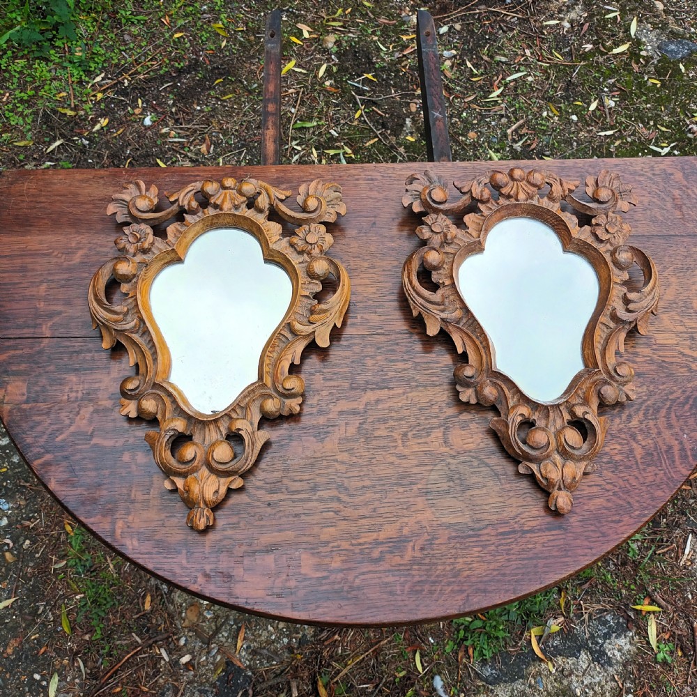 Pair of small carved pine wall mirrors.  View III