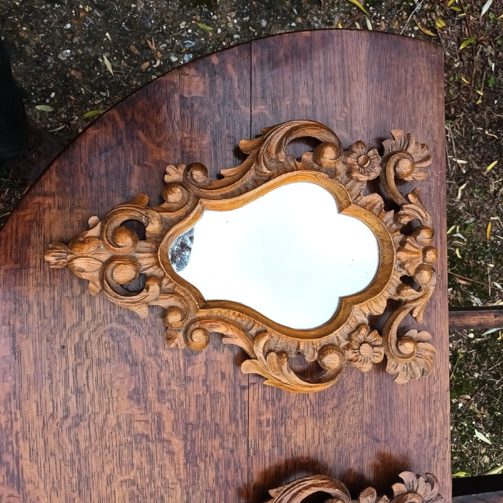 Pair of small carved pine wall mirrors.  View IV