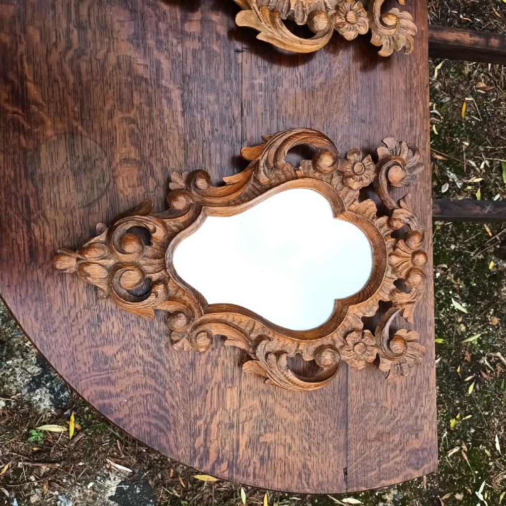 Pair of small carved pine wall mirrors.  View V