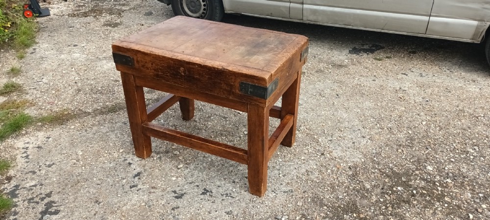 Butchers block on stand. 