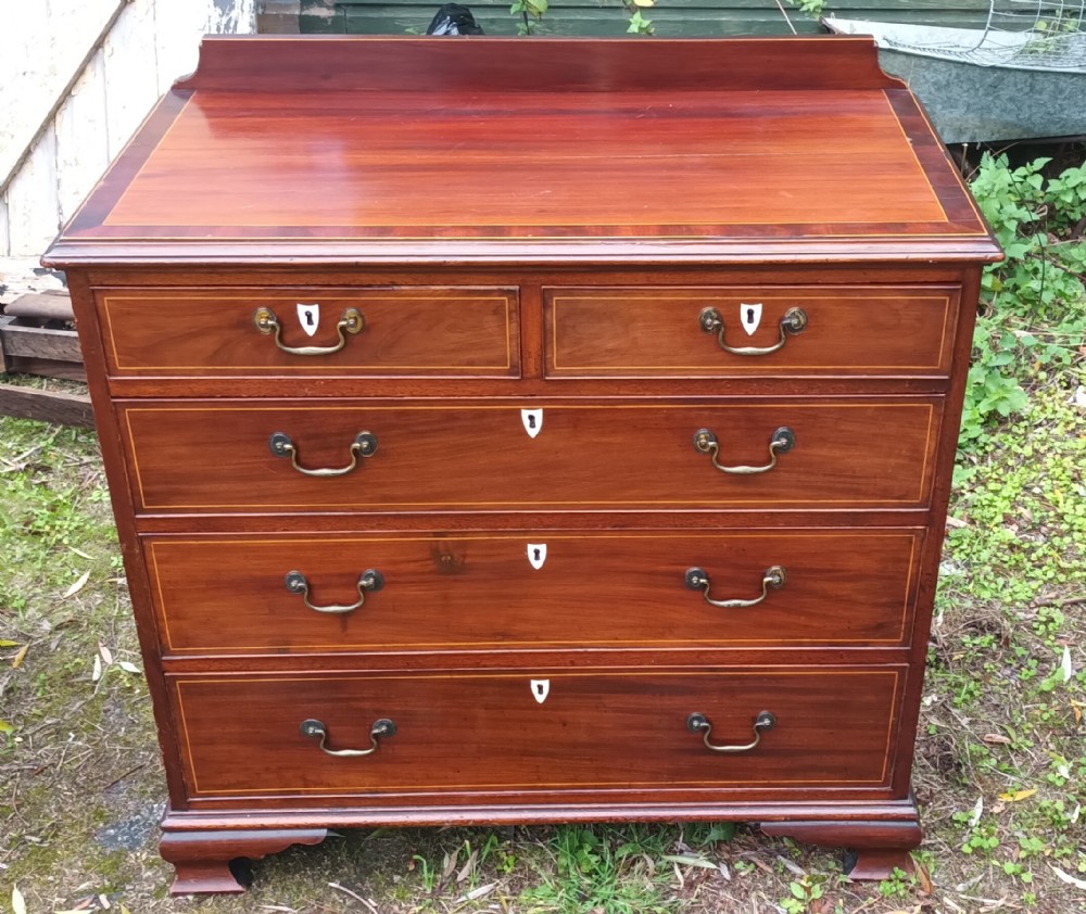 Late Georgian inlaid mahogany chest of drawers. 