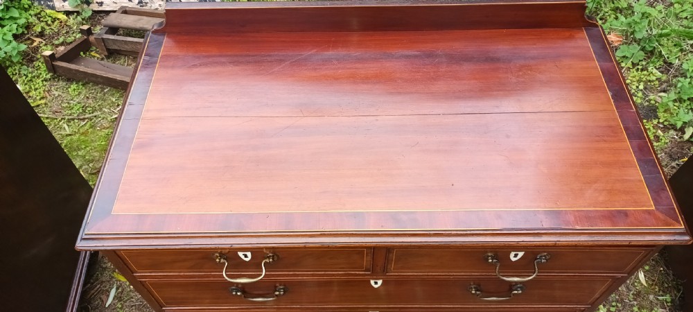 Late Georgian inlaid mahogany chest of drawers.  View VI