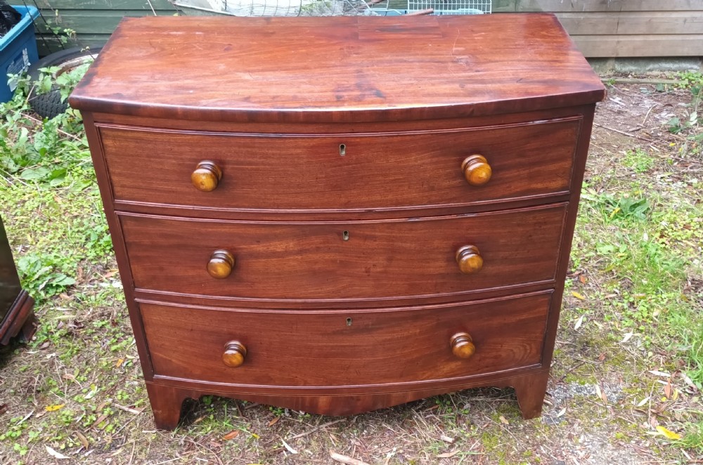 Early Victorian mahogany bow front chest of drawers. 