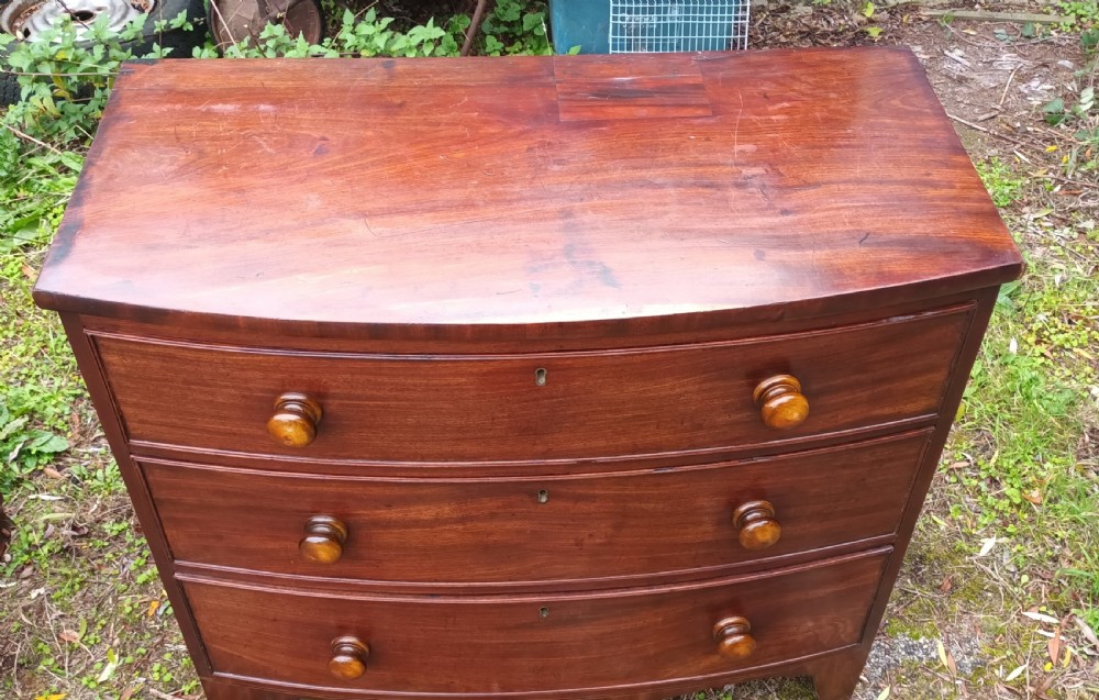 Early Victorian mahogany bow front chest of drawers.  View II