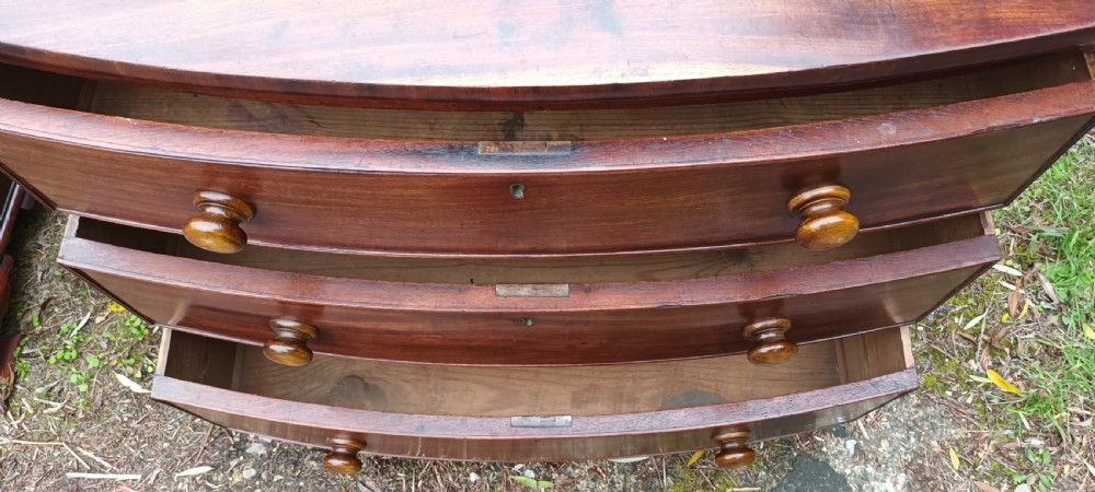 Early Victorian mahogany bow front chest of drawers.  View III