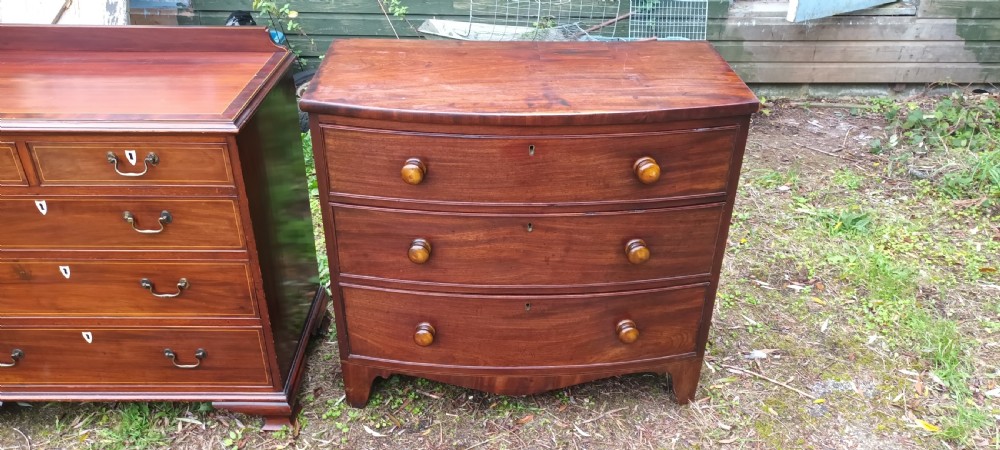 Early Victorian mahogany bow front chest of drawers.  View IV