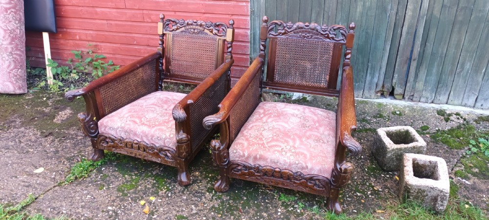 Pair of carved Mahogany framed bergere armchairs.  View II