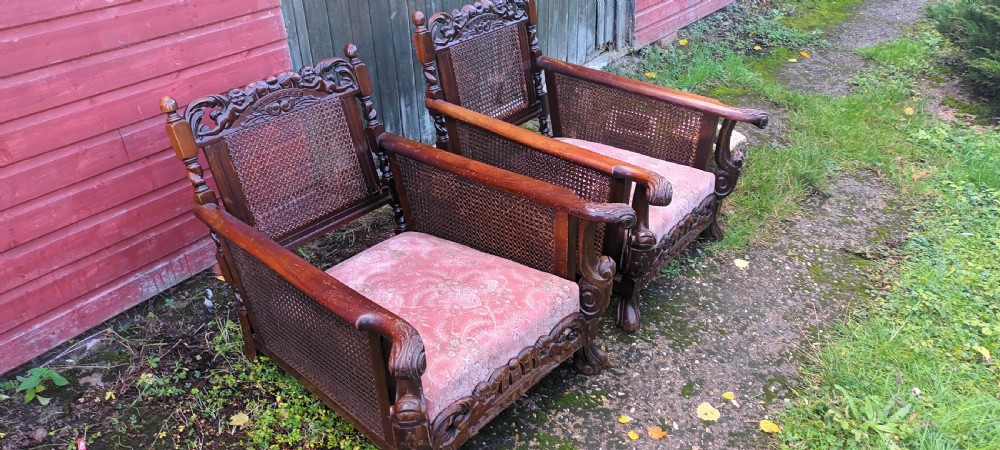 Pair of carved Mahogany framed bergere armchairs.  View III