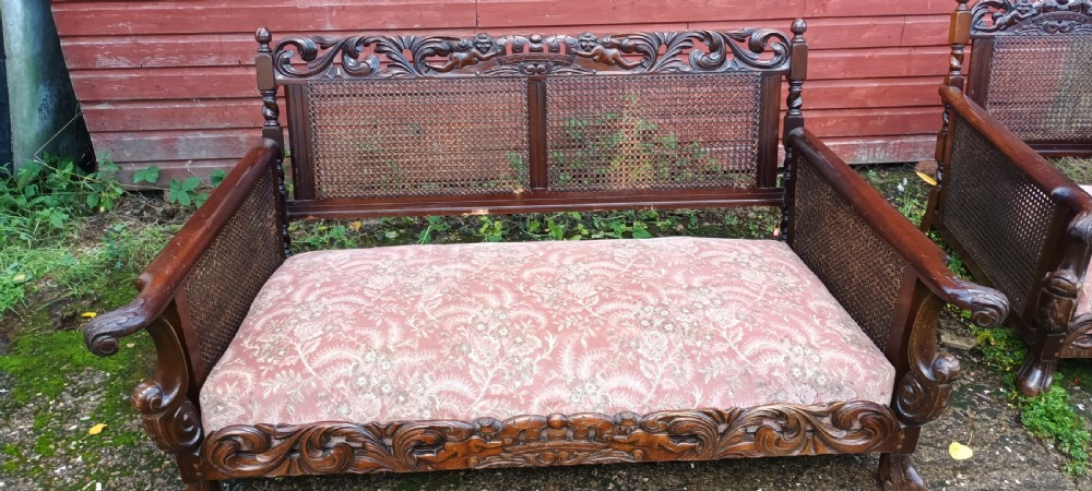 Carved Mahogany bergere sofa.  View II