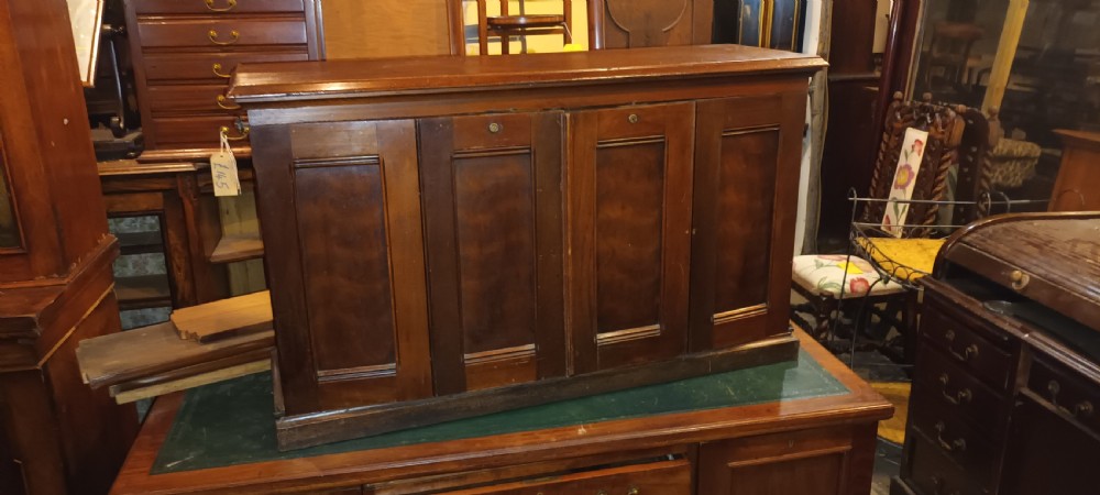 Fitted Amberg cabinet with folding doors.  View VII
