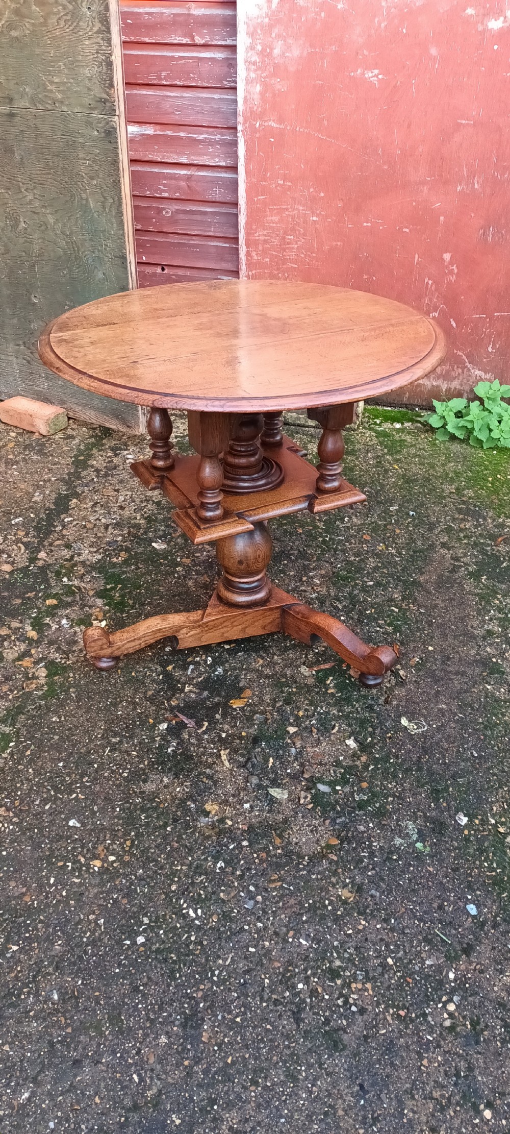 Unusual oak revolving occasional table 