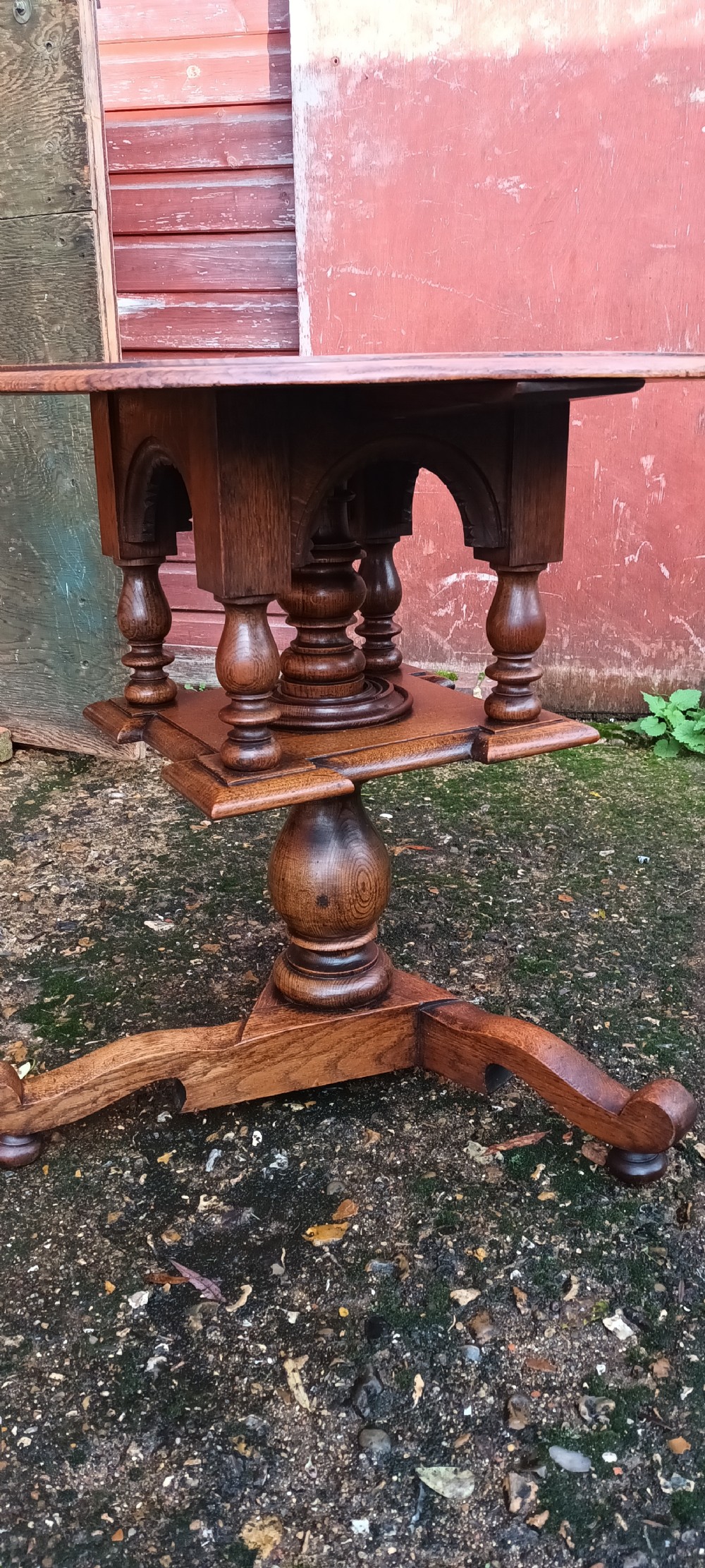 Unusual oak revolving occasional table  View II