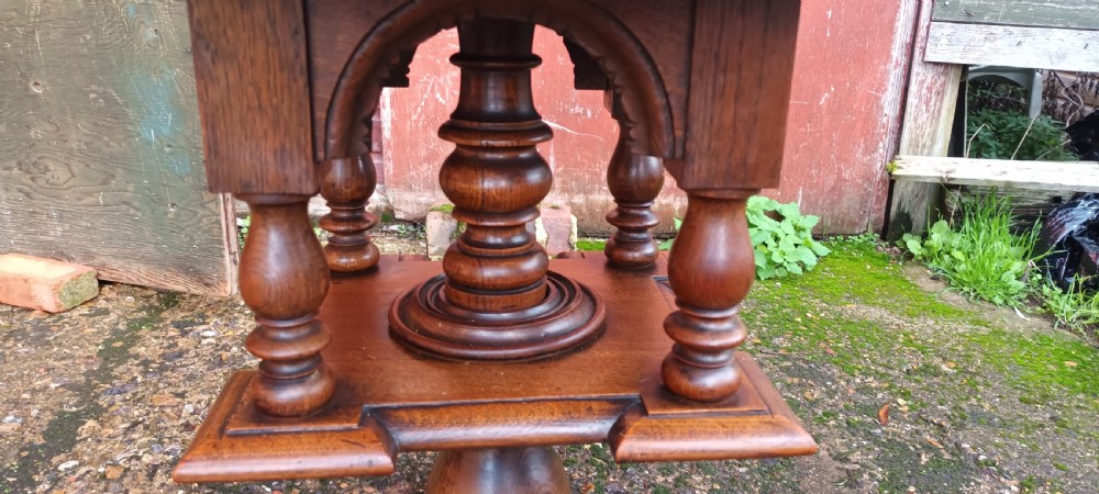 Unusual oak revolving occasional table  View III