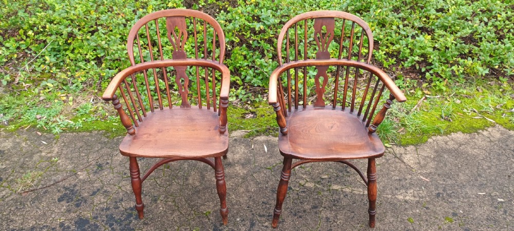 A close pair of Windsor armchairs.  View III