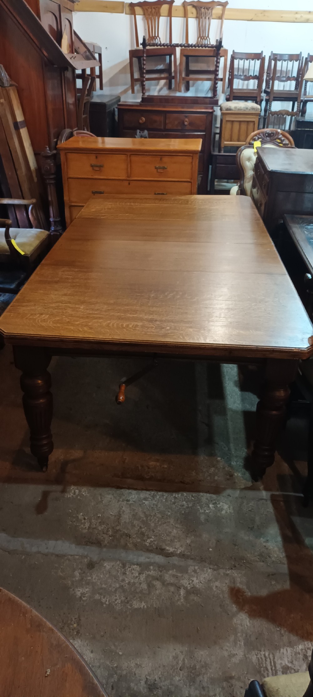 Late Victorian oak 2 leaf extending dining table.  View IV
