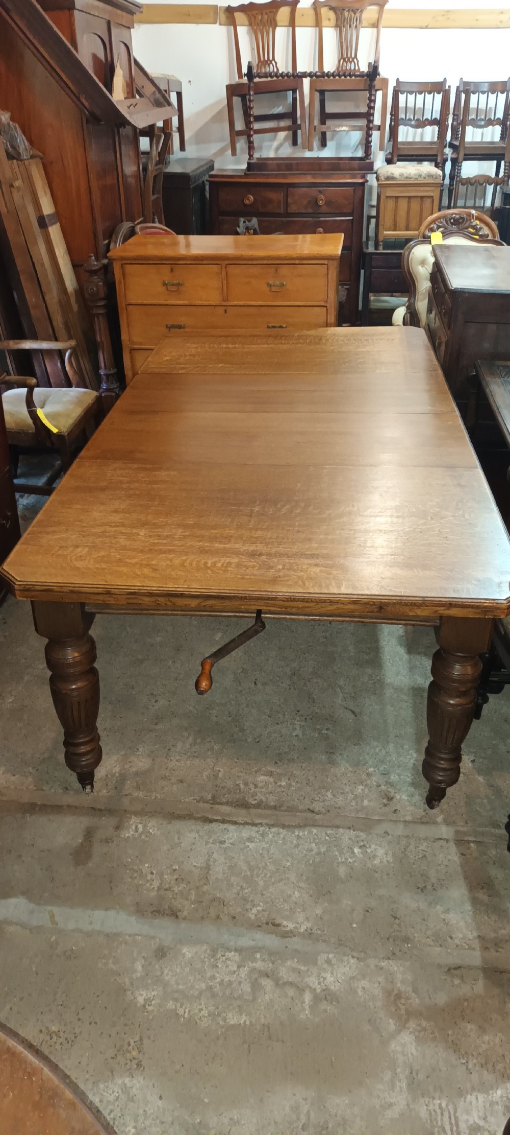 Late Victorian oak 2 leaf extending dining table.  View VI