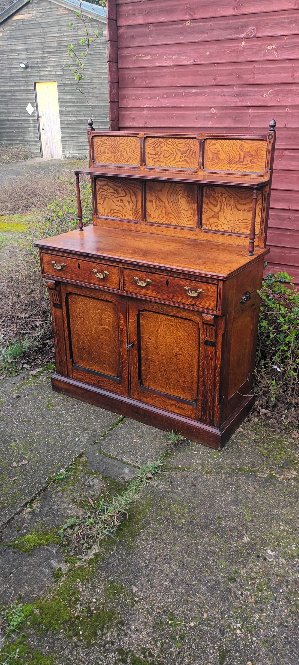 Neat Victorian oak side cabinet with stamped locks.  View II