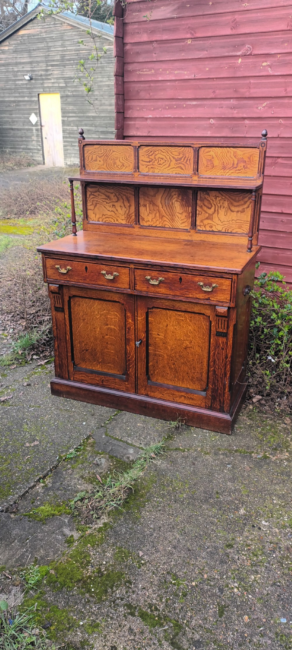 Neat Victorian oak side cabinet with stamped locks.  View III
