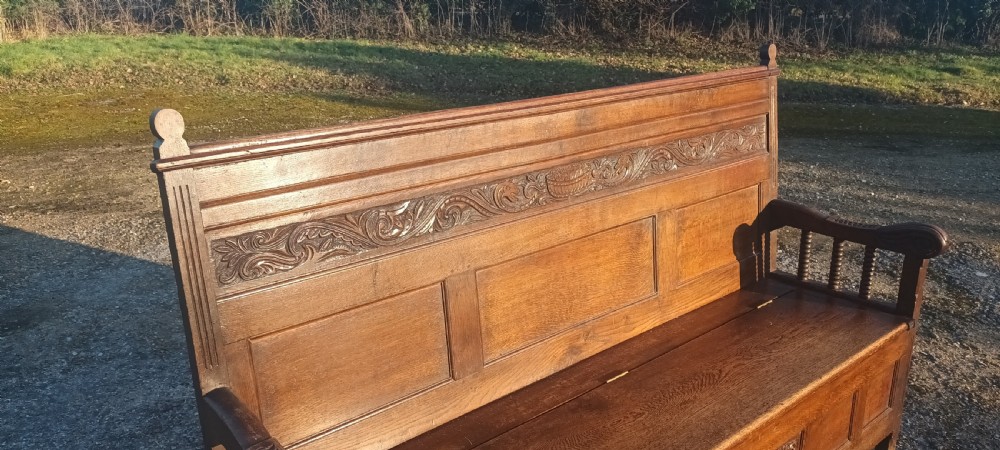 Large Victorian 6 foot panelled oak hall seat with lift up seat. View VI
