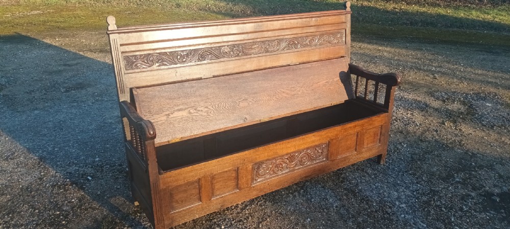 Large Victorian 6 foot panelled oak hall seat with lift up seat. View VII