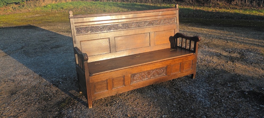 Large Victorian 6 foot panelled oak hall seat with lift up seat. View VIII