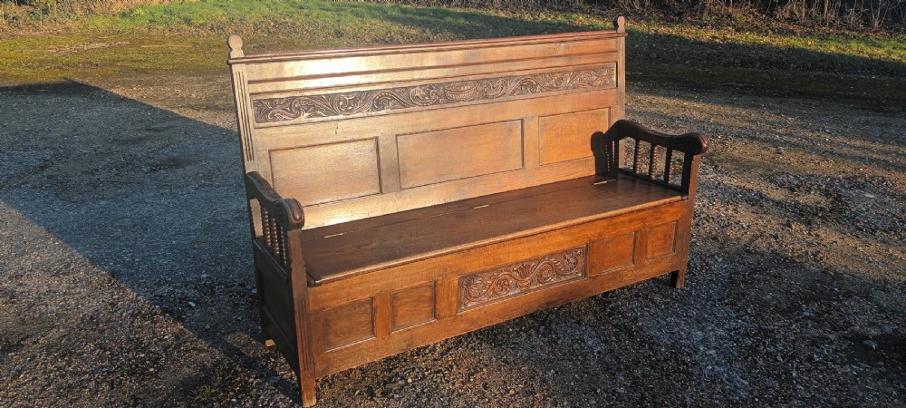 Large Victorian 6 foot panelled oak hall seat with lift up seat. View IX